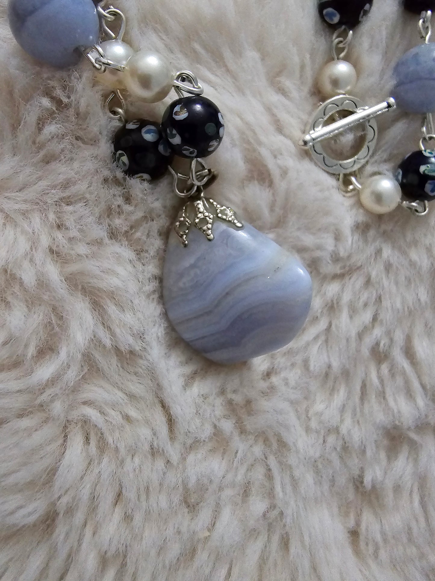 Beautiful necklace of Blue lace agate; large vintage natural stone, small pearls, vintage AV blue glass crystal beads and vintage Chinese hand painted porcelain beads.