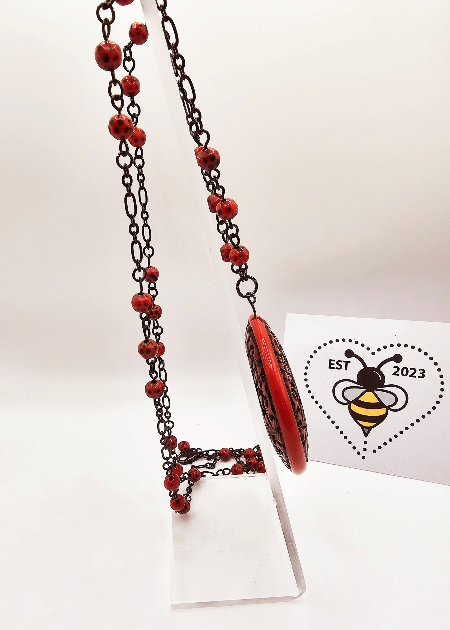 Modern copy of vintage cinnabar pendant