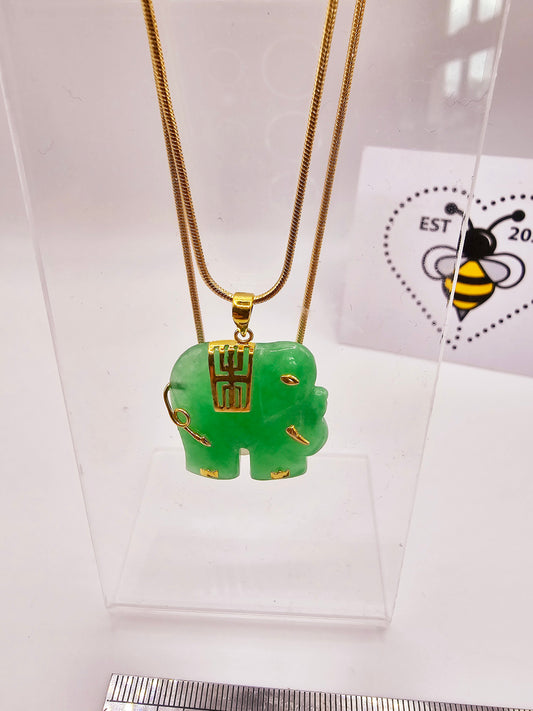 Jadeite apple green elephant pendant on 14ct gold chain