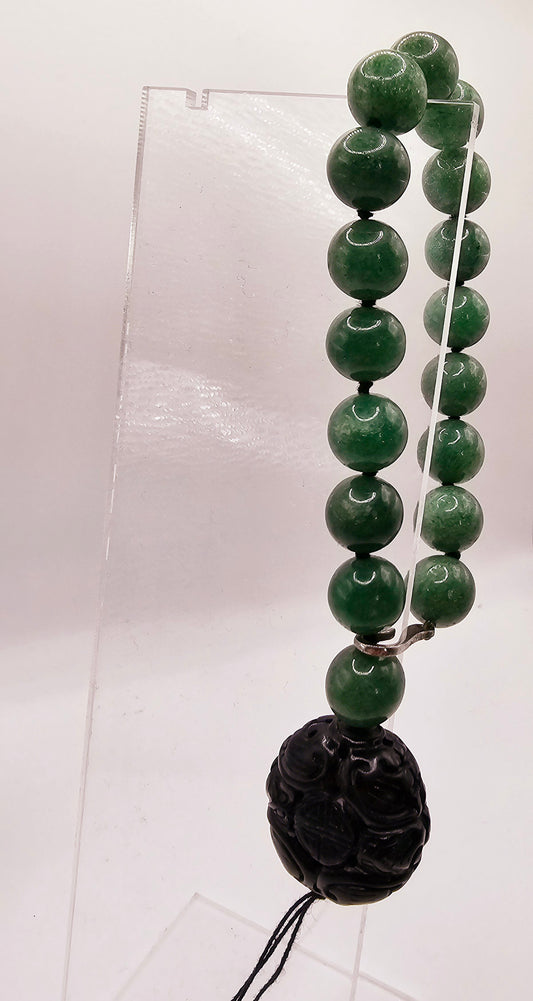 Green stone bracelet adjustable, possibly jade or aventurine...