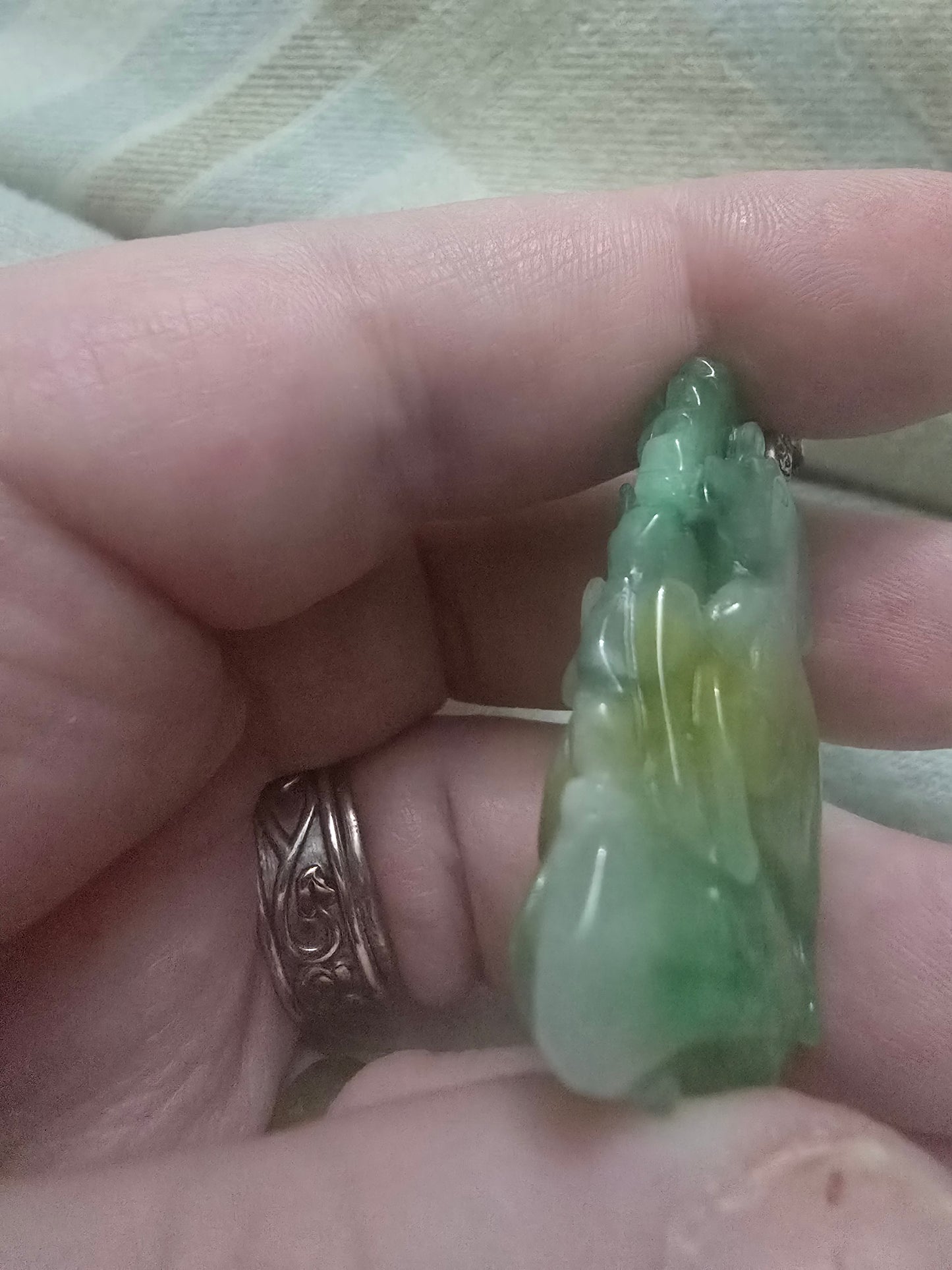 Apple Green and yellow jade Chinese year pendant. Fire horse and snake, very well carved.