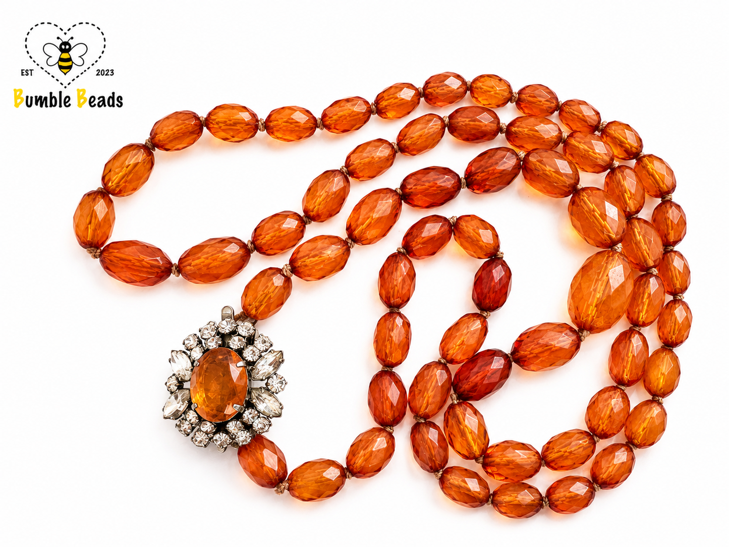 Mid-Century Natural Cognac Amber extra long necklace with graduated and faceted beads and statement clasp